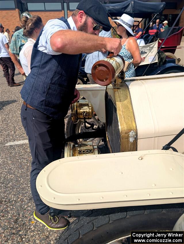 Wade Donley / Jenny Donley 1908 Overland stops for water in Anoka, MN.