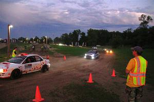 Richard Donovan / Greg Donovan Subaru Impreza and Mark Tabor / Kathryn Hansen Ford Fiesta ST exit out of SS2, Soo Pass II.