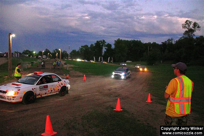 Richard Donovan / Greg Donovan Subaru Impreza and Mark Tabor / Kathryn Hansen Ford Fiesta ST exit out of SS2, Soo Pass II.