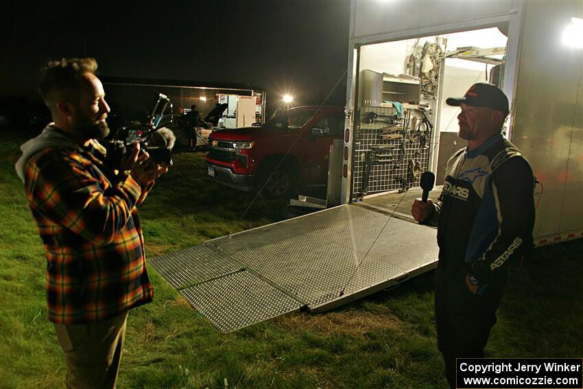 A driver is interviewed at Pioneer Farm service after day two.
