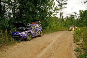 Sweep arrives to pick up the Patrick Gruszka / John Hall Hyundai i20 R5 from SS11, Otterkill I.