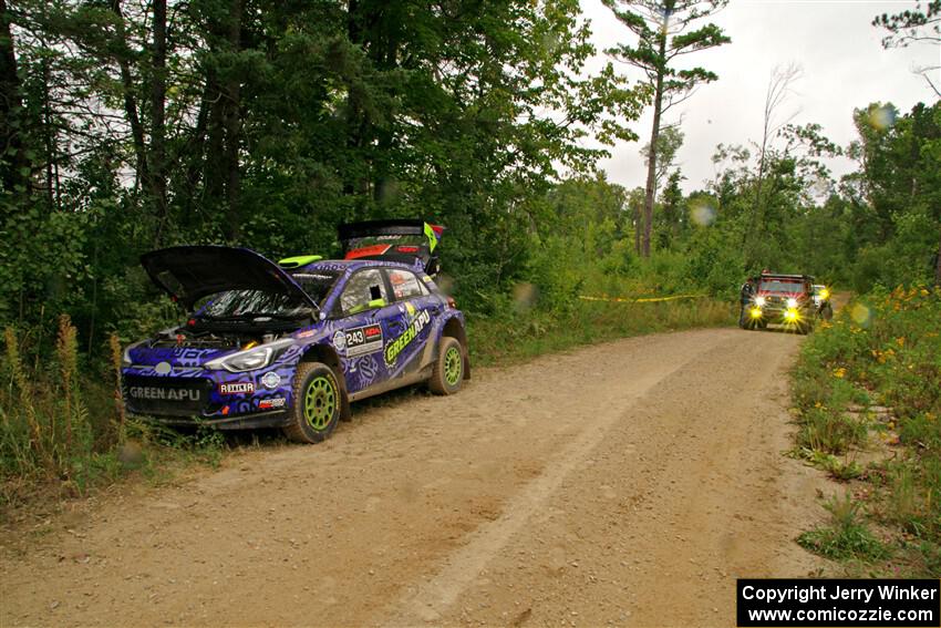 Sweep arrives to pick up the Patrick Gruszka / John Hall Hyundai i20 R5 from SS11, Otterkill I.