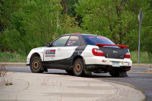 Jason Cook / Maggie Tu Subaru WRX on SS20, Sanford Center.