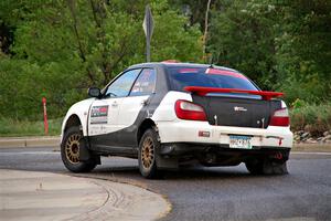 Jason Cook / Maggie Tu Subaru WRX on SS20, Sanford Center.