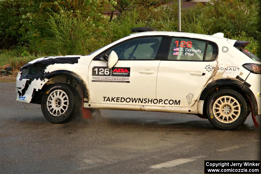 Sean Donnelly / Zach Pfeil Peugeot 208 Rally4 on SS20, Sanford Center.