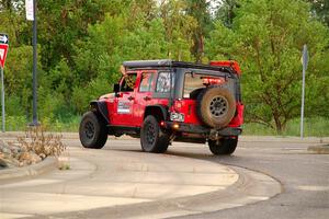 A Jeep Wrangler Rubicon sweeps SS20, Sanford Center.