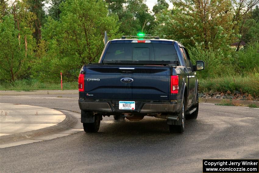 A Ford F-150 pickup sweeps SS20, Sanford Center.