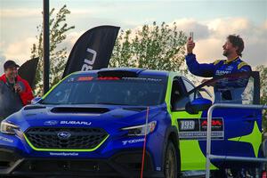 Travis Pastrana takes a selfie on the winner's podium.