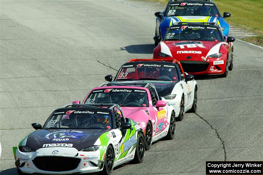 Five Mazda MX-5 Cup cars head into turn 7 during race 1.