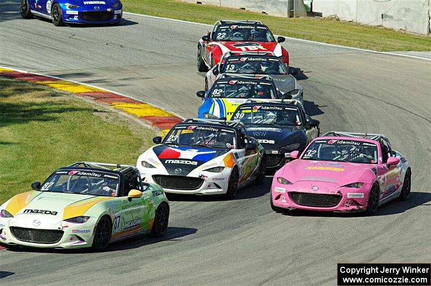 Seven Mazda MX-5 Cup cars battle in Canada Corner.
