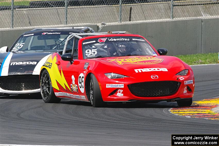 Farhan Siddiqi gets tapped by Bryan Heitman, both in Mazda MX-5 Cups.