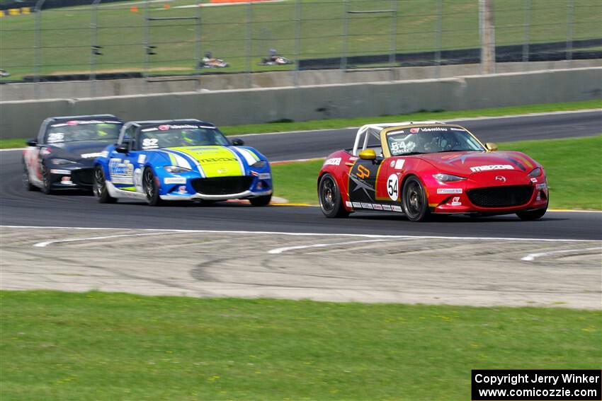 Heather Hadley's, Woody Heimann's and Jonathan Neudorf's Mazda MX-5 Cups