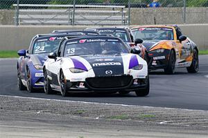 Five cars battle through turn 8.