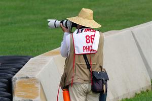 Road America photographer Pete Gorski shoots the second race from the outside of turn 8.