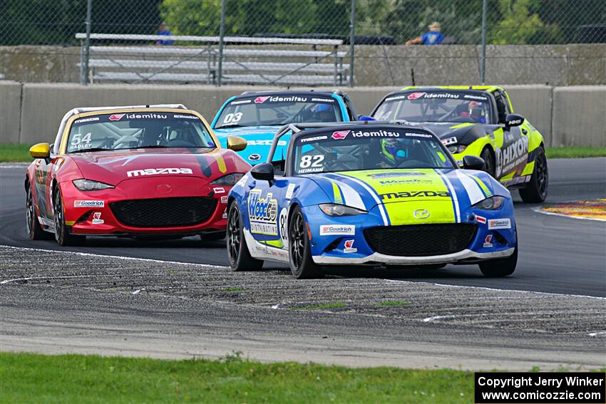 Woody Heimann's, Heather Hadley's, John Hansen's and Bailey Cruse's Mazda MX-5 Cups