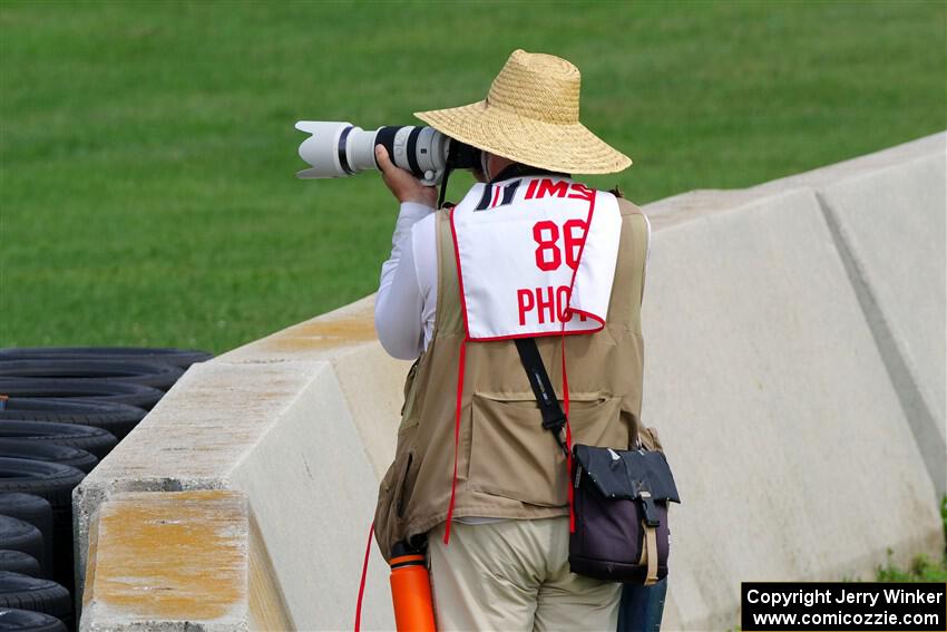 Road America photographer Pete Gorski shoots the second race from the outside of turn 8.