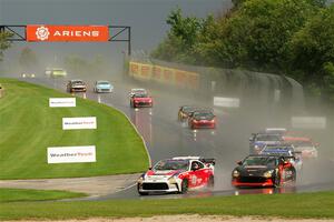 The field streams down into turn 3 on the restart.
