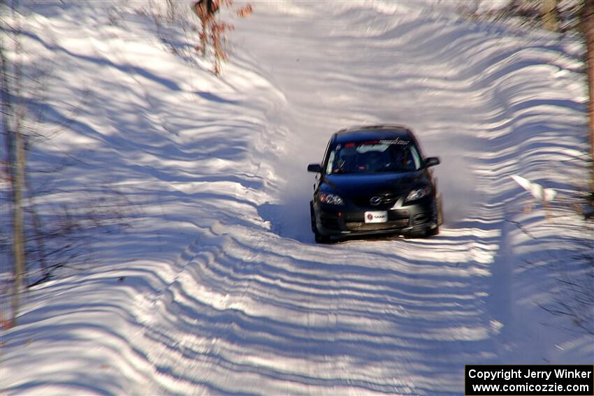 Sandy Liversidge / Tiago Lourenco Mazda Speed 3 on SS13, Sage Creek-Vondette.