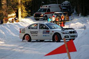 Steve Rowlands / Tessa Jordan BMW 330i spins on SS15, Agren-Hunters II.