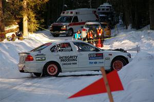 Steve Rowlands / Tessa Jordan BMW 330i spins on SS15, Agren-Hunters II.