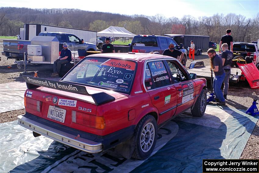Levi Johnson / Griffin Johnson BMW 325e at Potosi service on day one.