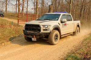 A Ford F-150 Raptor pickup sweeps SS9, KP to Ollie Long II.