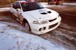 Seamus Burke / Rory Kennedy Mitsubishi Lancer Evo VI with a flat tire on SS7, Black River.