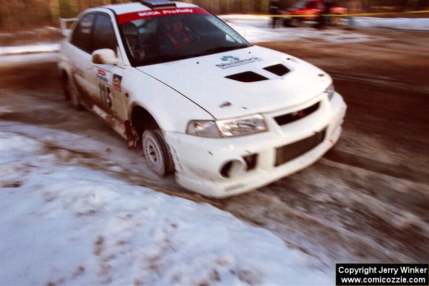 Seamus Burke / Rory Kennedy Mitsubishi Lancer Evo VI with a flat tire on SS7, Black River.