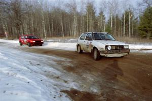Pablo Sanfrancisco / Rob Bergstrom VW GTI is chased by Dave Cizmas / Dave L. Cizmas VW GTI on SS7, Black River.