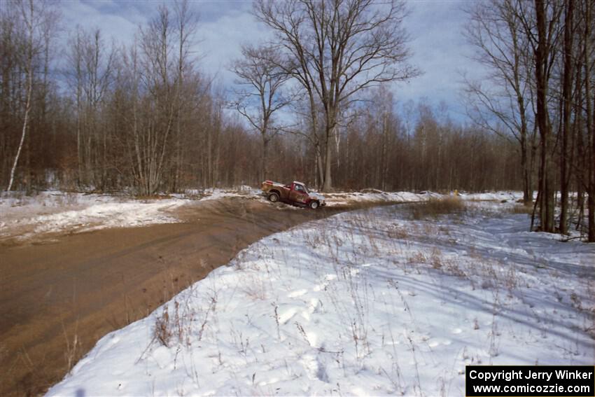 Jim Cox / Kaari Cox Chevy S-10 slides off into a snowbank on SS10, Camp 30.