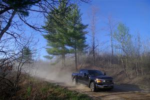 A Ford F-150 pickup sweeps SS6, Kabekona III.