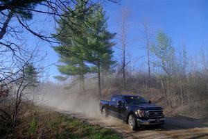 A Ford F-150 pickup sweeps SS6, Kabekona III.