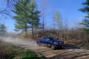 A Ford F-150 pickup sweeps SS6, Kabekona III.