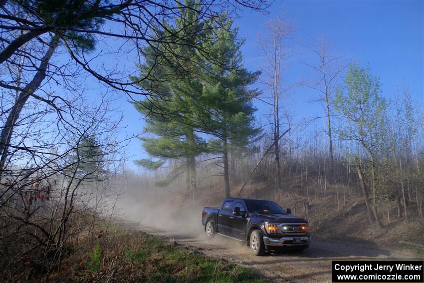 A Ford F-150 pickup sweeps SS6, Kabekona III.