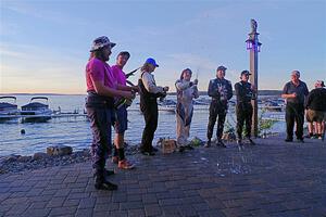 The Overall podium ceremonial champagne spray.