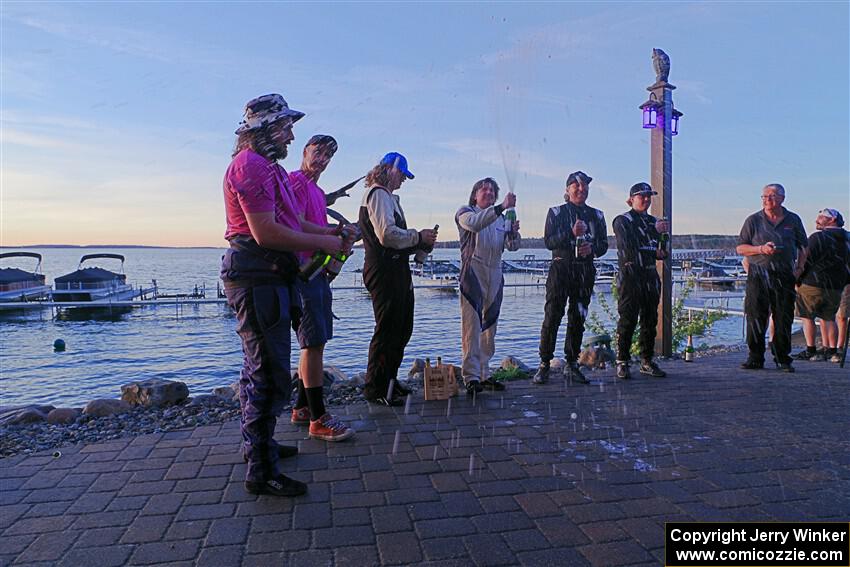 The Overall podium ceremonial champagne spray.