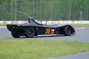 Will Cammack's Spec Racer Ford spins in the carousel.