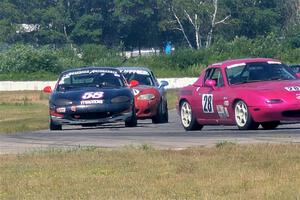Josh Jablonski's, Austin Pearce's and Chris Craft's Spec Mazda Mazda Miatas