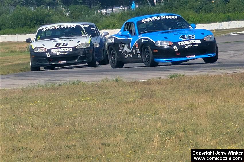 Kyle Greenhill's, Samantha Silver's and Tyler Brown's Spec Miata Mazda Miatas