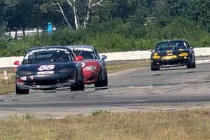 Austin Pearce's, Chris Craft's and George Ellis' Spec Miata Mazda Miatas
