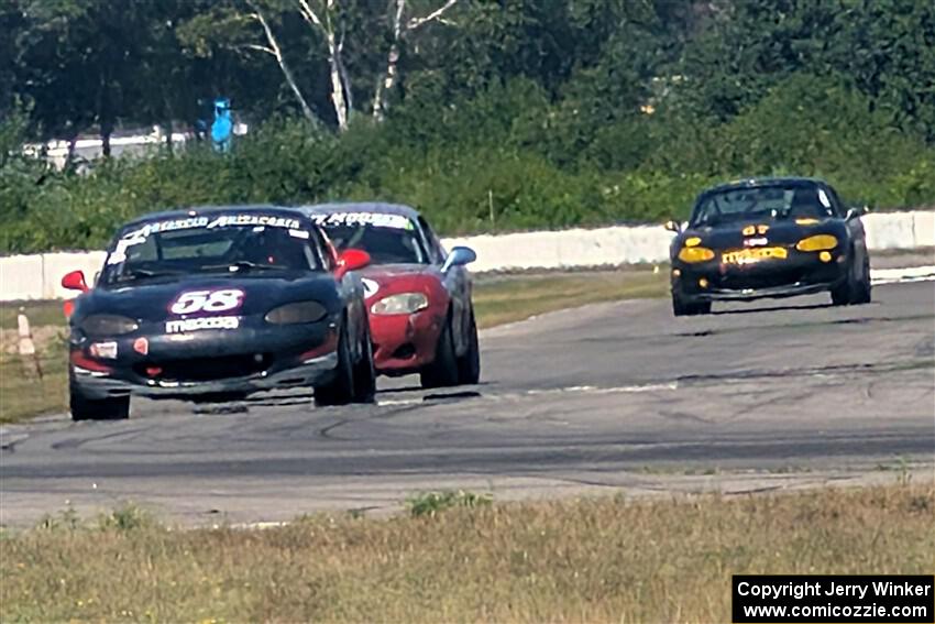Austin Pearce's, Chris Craft's and George Ellis' Spec Miata Mazda Miatas