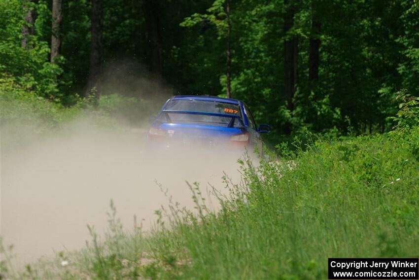 Jimmy Pelizzari / Bryce Proseus Subaru WRX on SS1, Camp 3 North.
