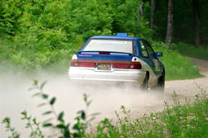 Jacob Kennedy / Josh Remmetter Ford Escort GT on SS1, Camp 3 North.