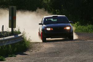 Gary Klein / Sam Strickhouser Saturn Ion Redline on SS6, Camp 3 South.