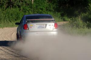 Gary Klein / Sam Strickhouser Saturn Ion Redline on SS6, Camp 3 South.