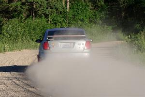 Gary Klein / Sam Strickhouser Saturn Ion Redline on SS6, Camp 3 South.