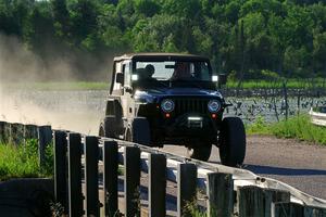A Jeep Wrangler sweeps SS6, Camp 3 South.