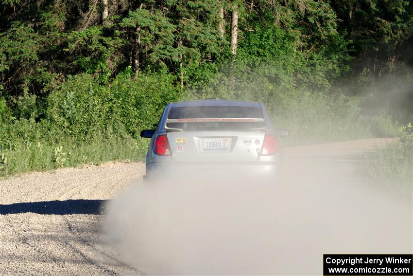 Gary Klein / Sam Strickhouser Saturn Ion Redline on SS6, Camp 3 South.