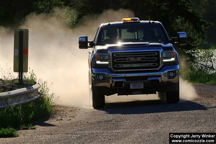 A GMC Sierra pickup sweeps SS6, Camp 3 South.