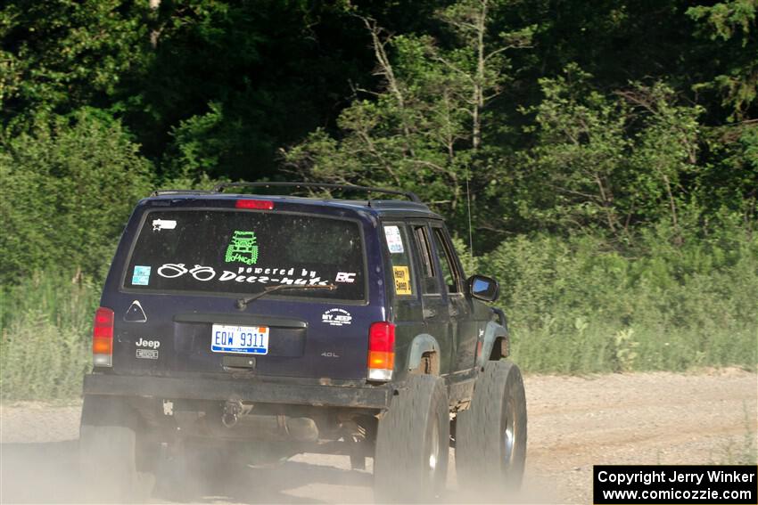 A Jeep Wrangler sweeps SS6, Camp 3 South.